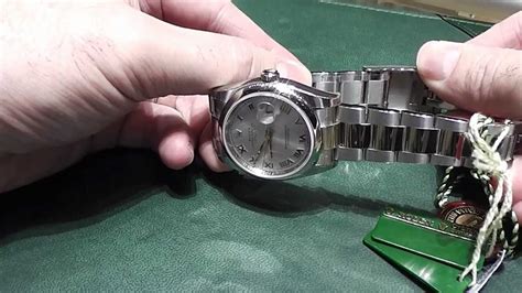 how to adjust rolex clasp.